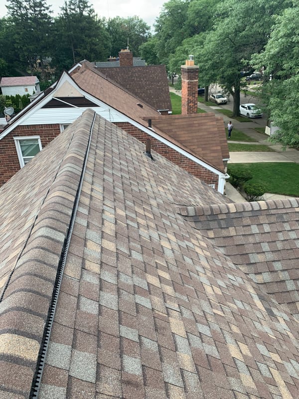 Professional roofing installation on a residential home